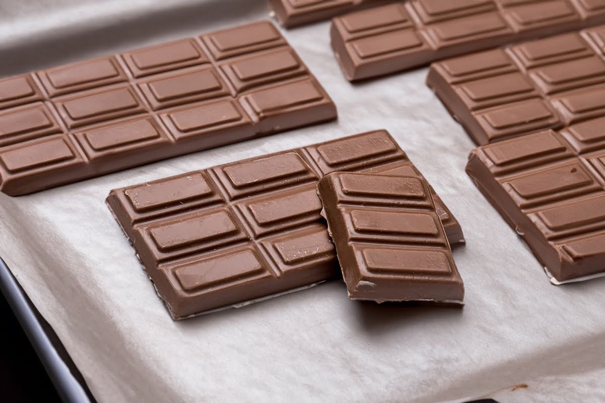 stefanelli's break-away bars lined on parchment paper frozen chocolate stefnelli's candies